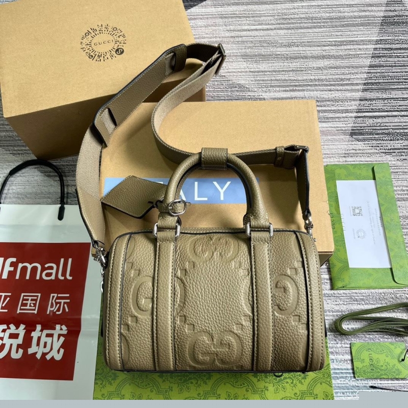 G*u*i top handle bags